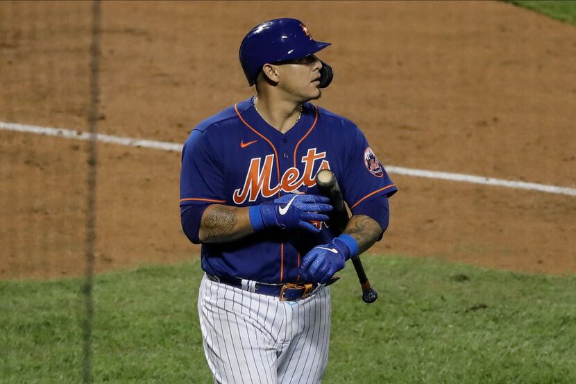 New York Mets' Wilson Ramos reacts after striking out during the ninth inning of a baseball...