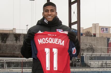 Harold Santiago Mosquera holds up the #11 jersey he will be wearing for FC Dallas in 2018.