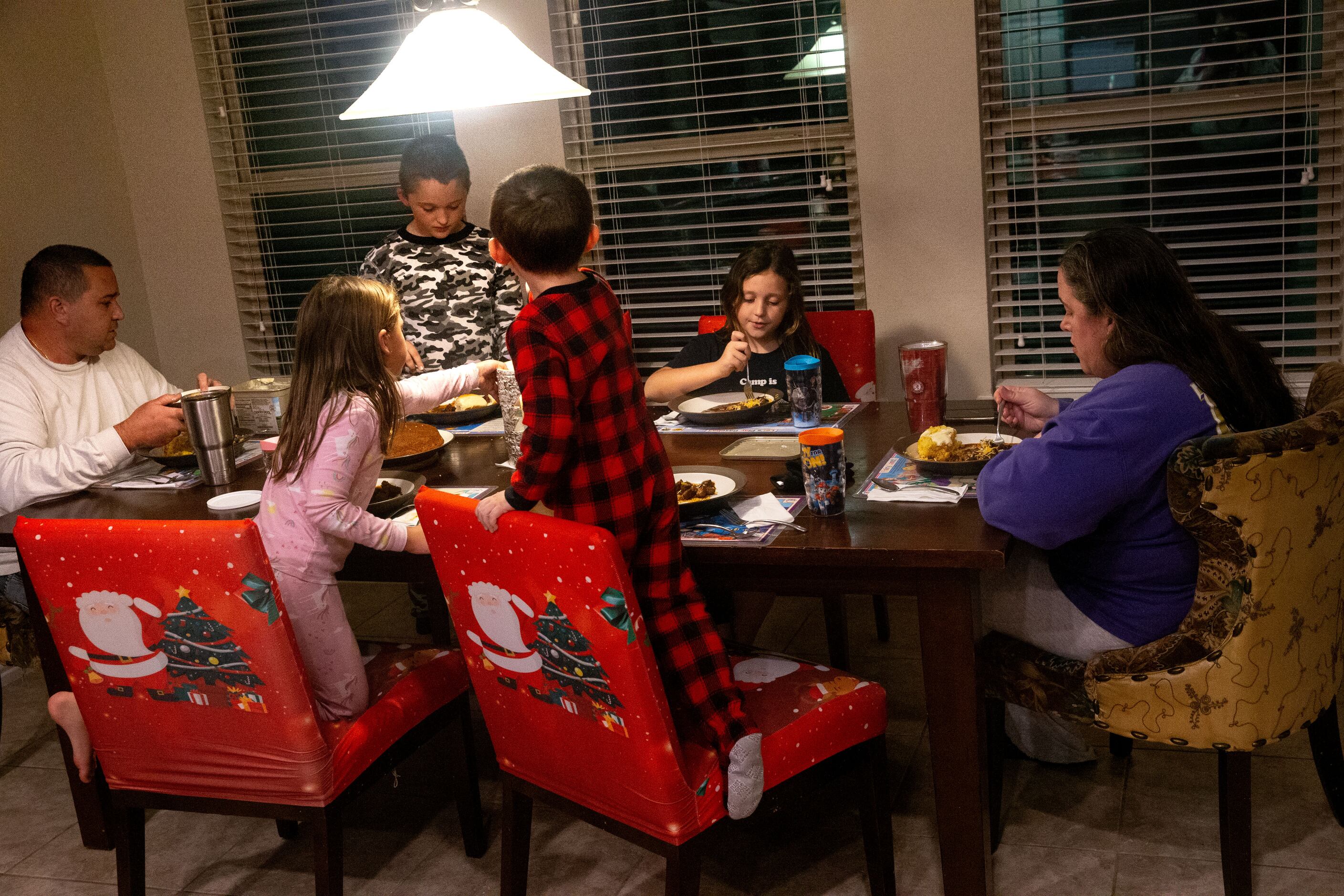 Rowley eats dinner with husband Brian and their children Emery, 9; Emily, 8; Avery, 6; and...