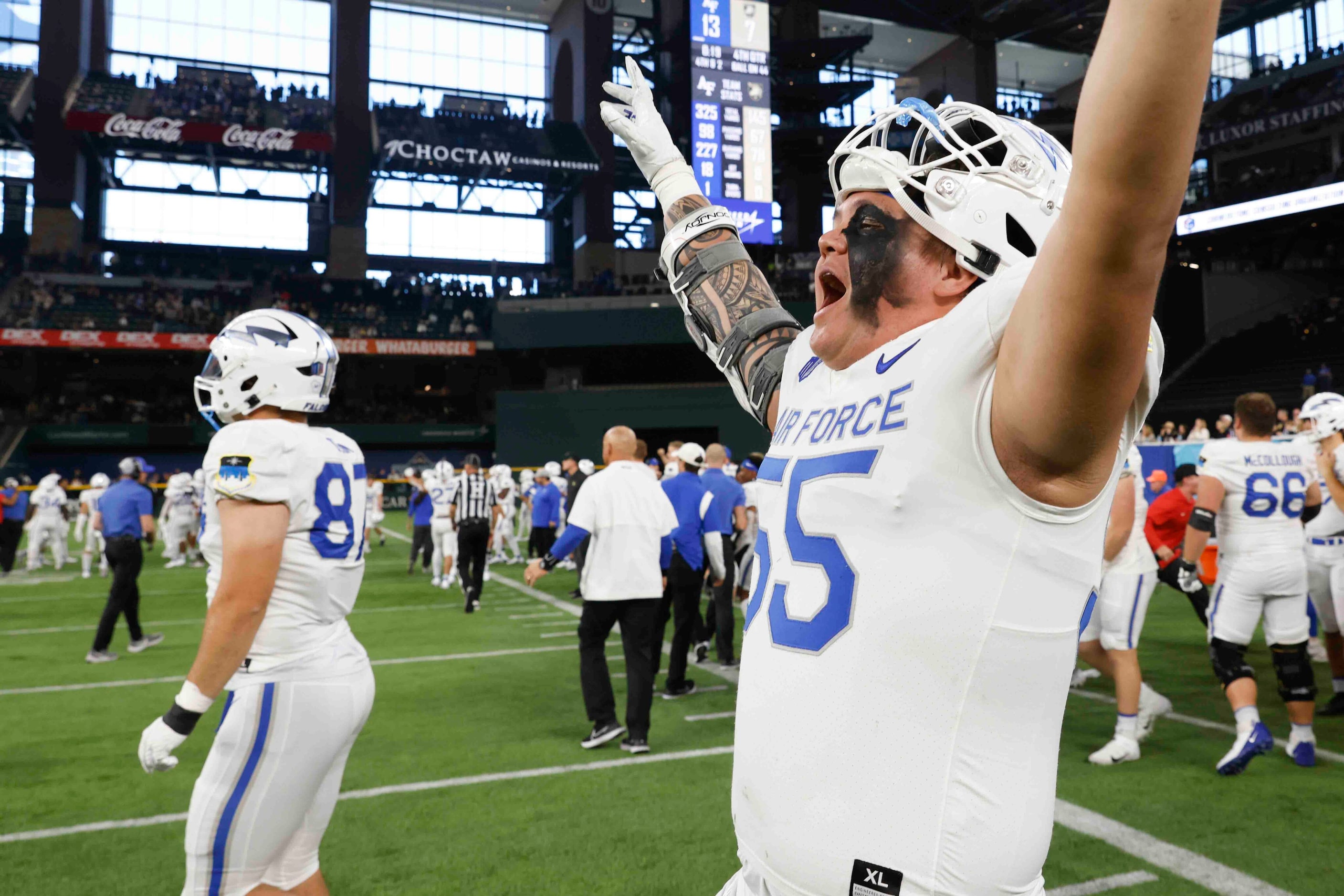 Air Force players celebrate their win against Army during an NCAA football game at Globe...