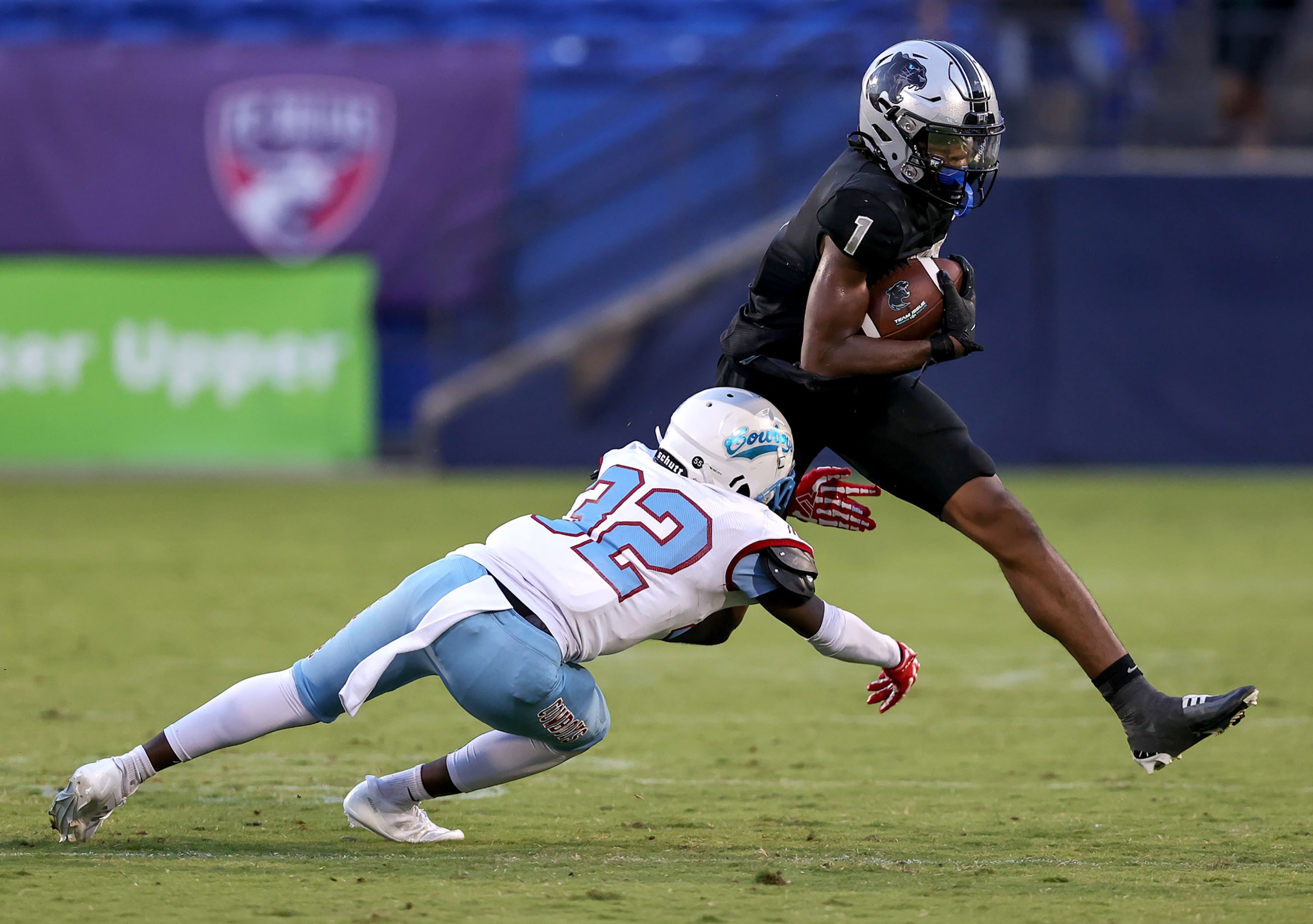 Frisco Panther Creek wide receiver Sentel Simpson (1) tries to elude Dallas Carter defensive...