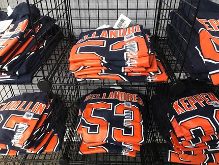 Shirts with Ty Dellandrea's name and number are sold in Flint, Mich.