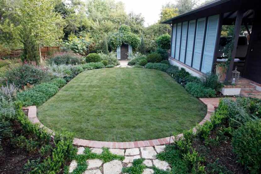 
Zoysia grass makes a velvety back lawn. 
