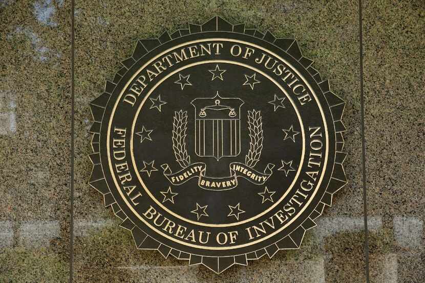 This 2016 file photo shows the FBI seal outside the headquarters building in Washington, DC