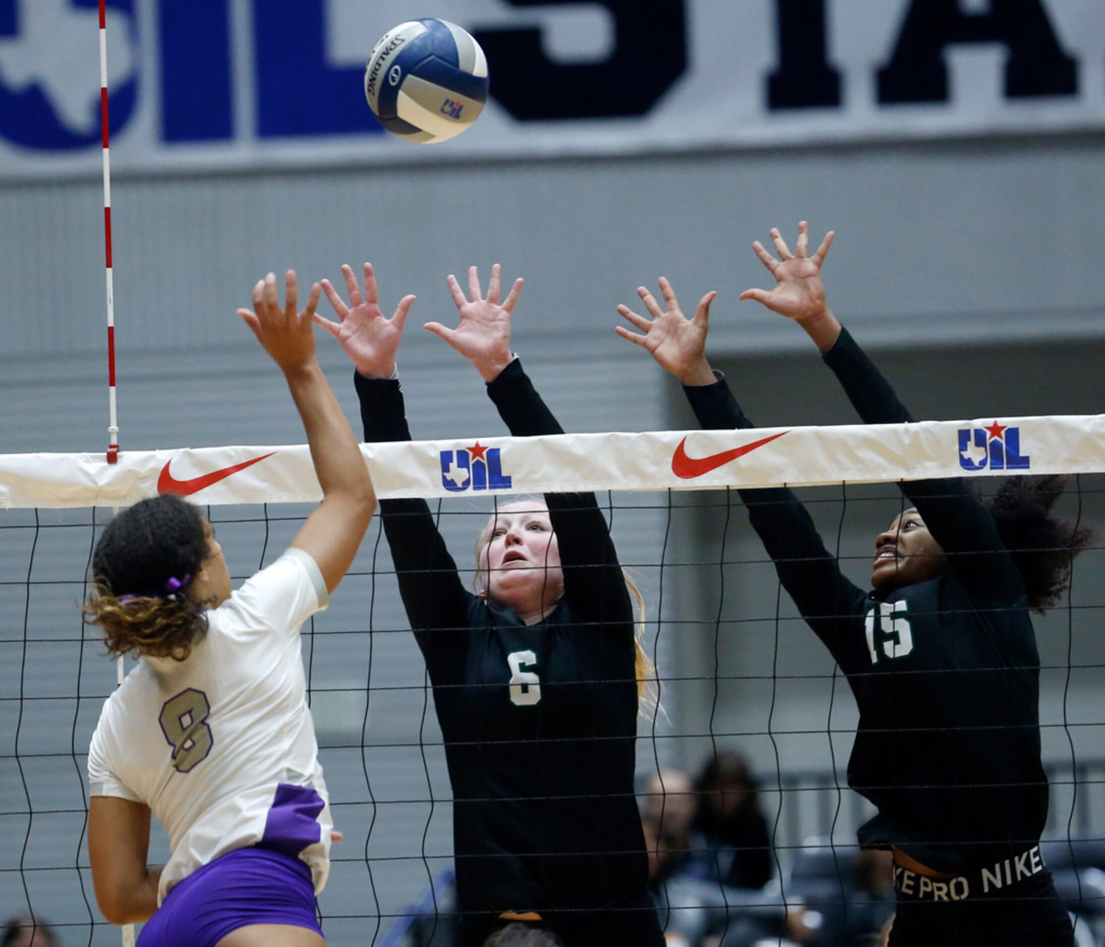 Kennedaleâs Bridget Barton (6) and Alexandra Youngblood (15) attempt fail to block...