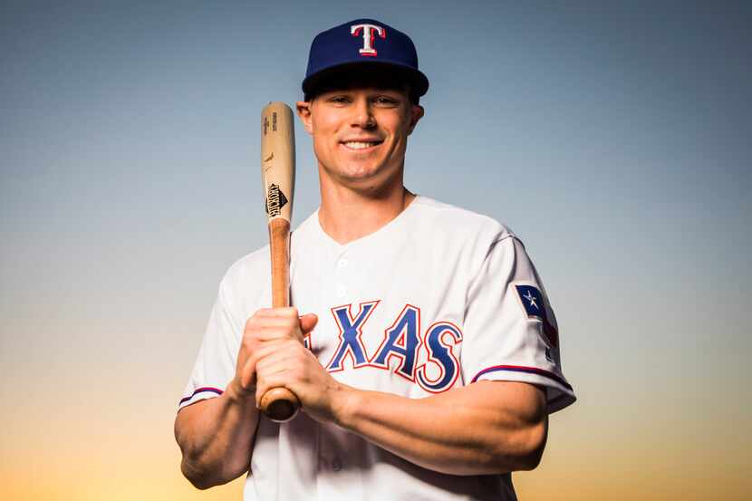 Texas Rangers outfielder Scott Heineman poses for a photo during Spring Training picture day...