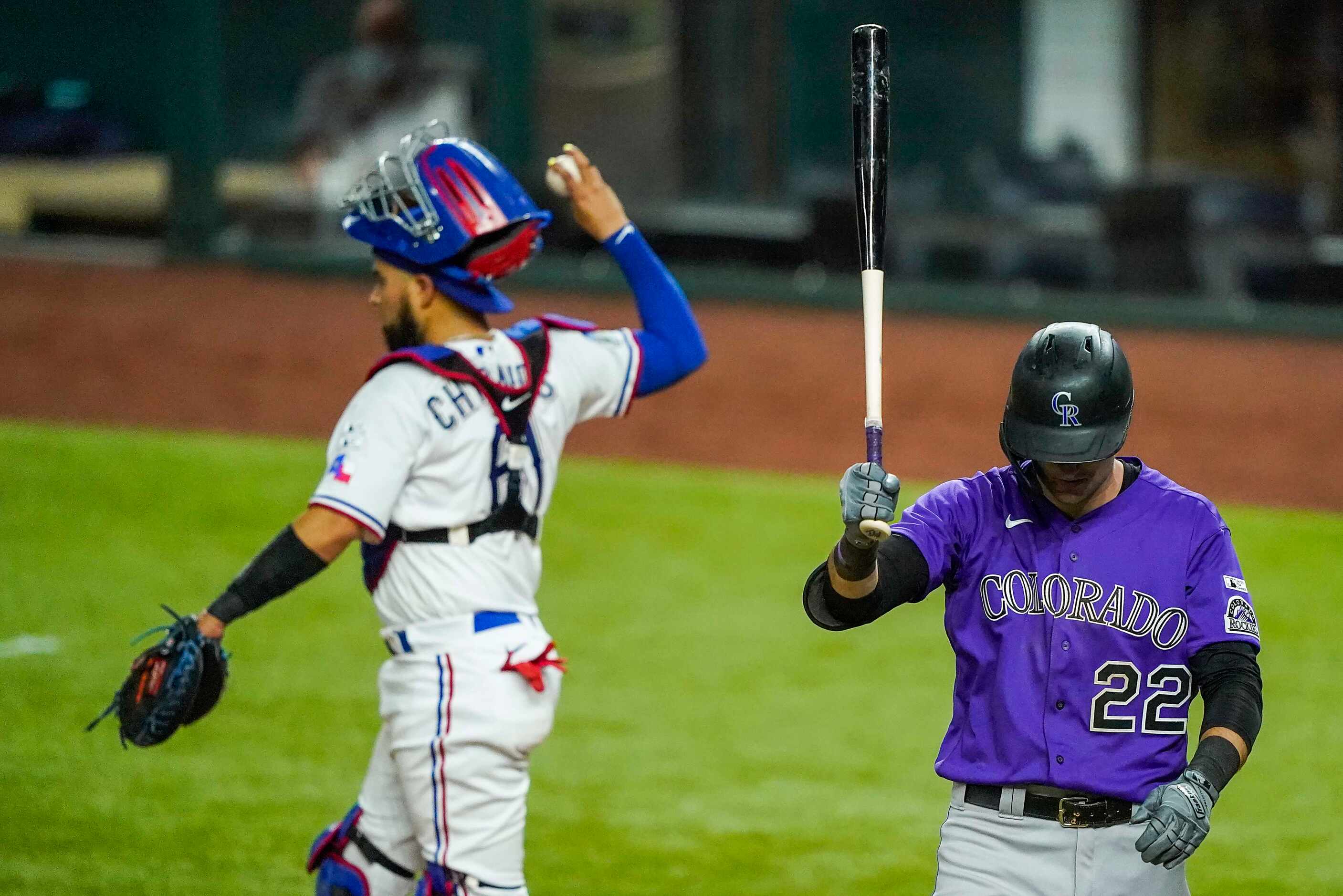 Colorado Rockies outfield Sam Hilliard reacts after striking out during the ninth inning...
