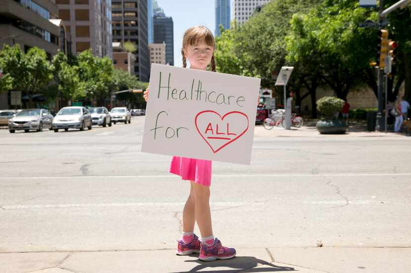 Amari Carter, 5, protests the U.S. House passage of the plan to repeal and replace the...