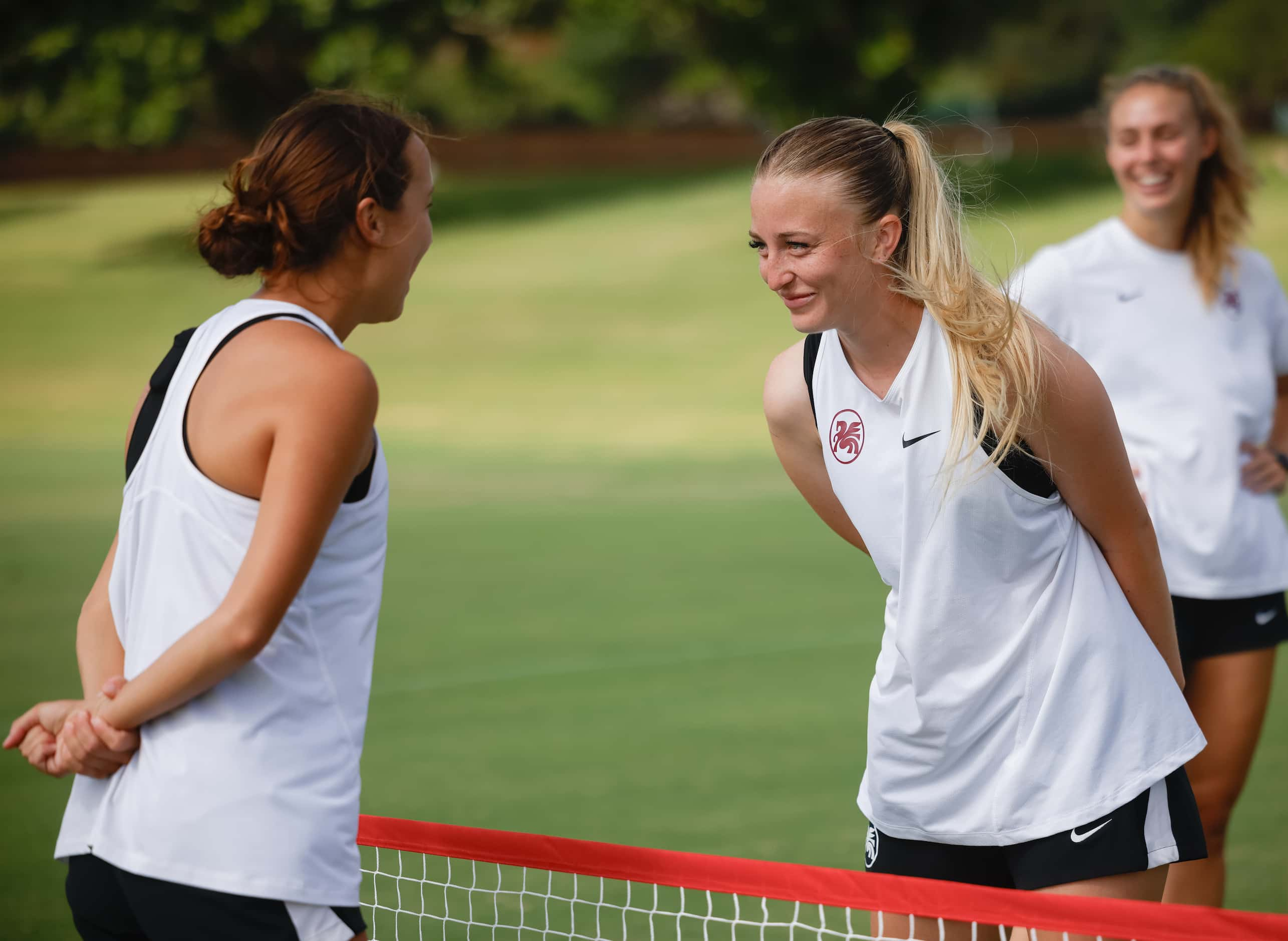 From left, Dallas Trinity FC players Gracie Bryan and Haley Berg prepare to throw...