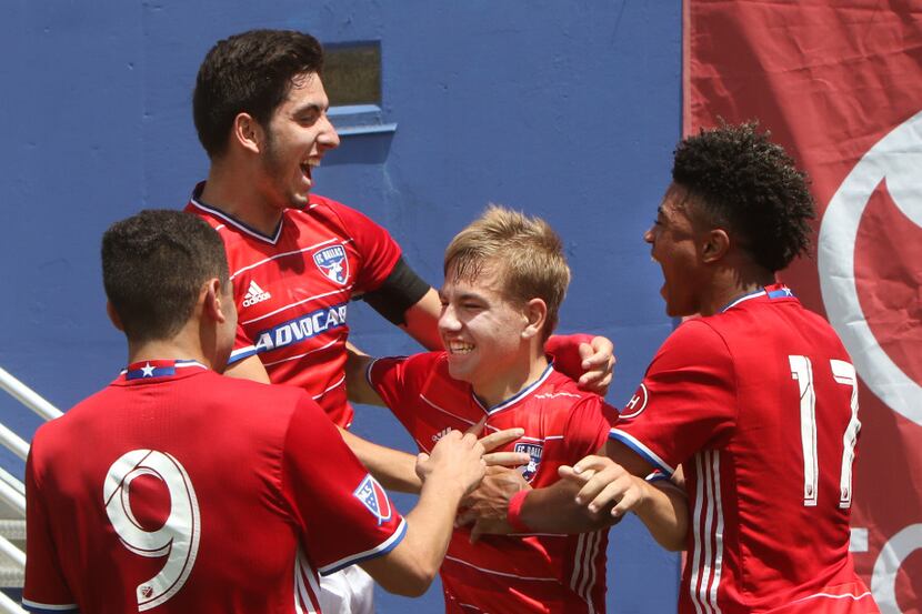 FC Dallas U18 Academy's Paxton Pomykal (center), pictured here in an earlier match, scored...
