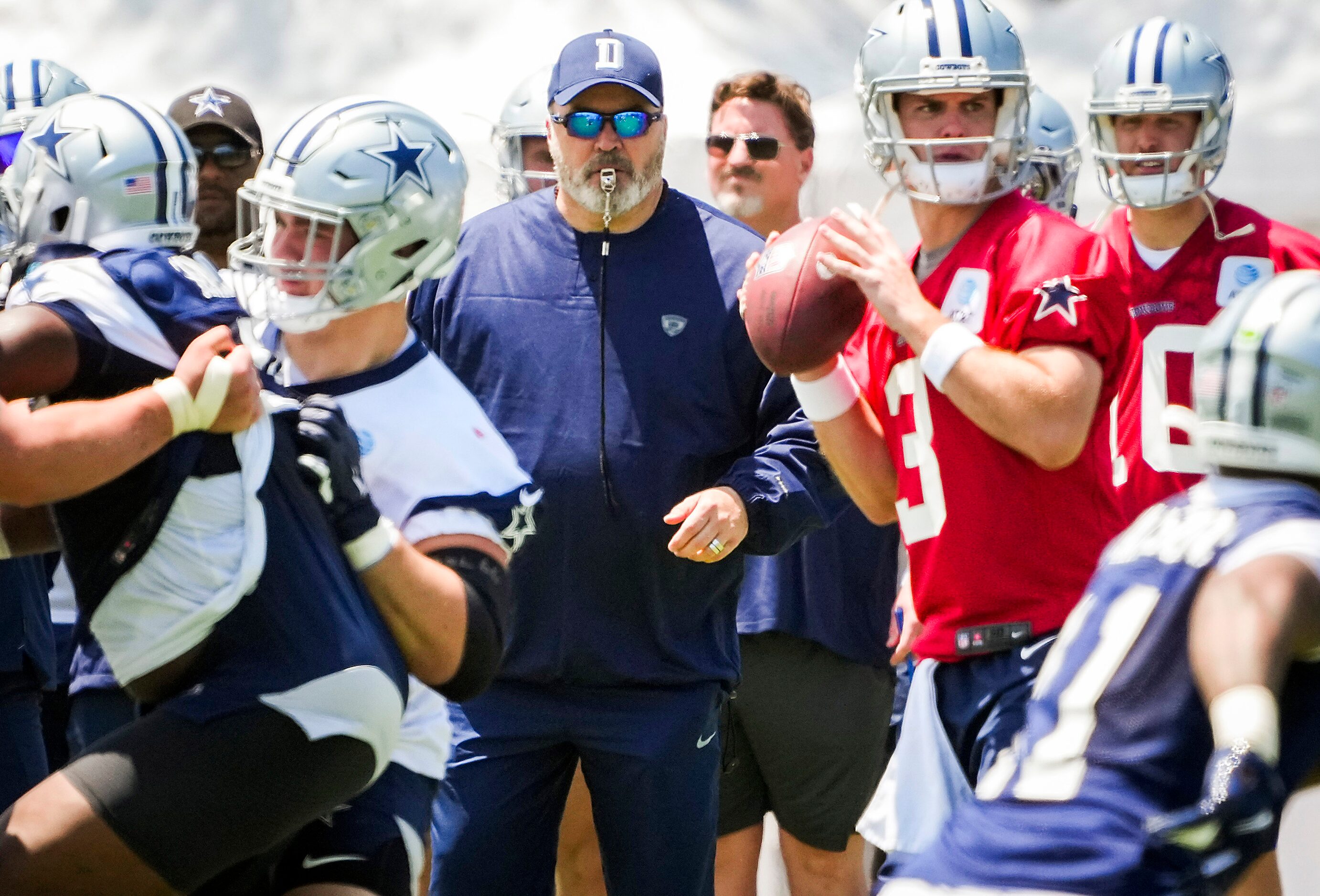 Dallas Cowboys head coach Mike McCarthy watches as quarterback Garrett Gilbert (3) runs a...