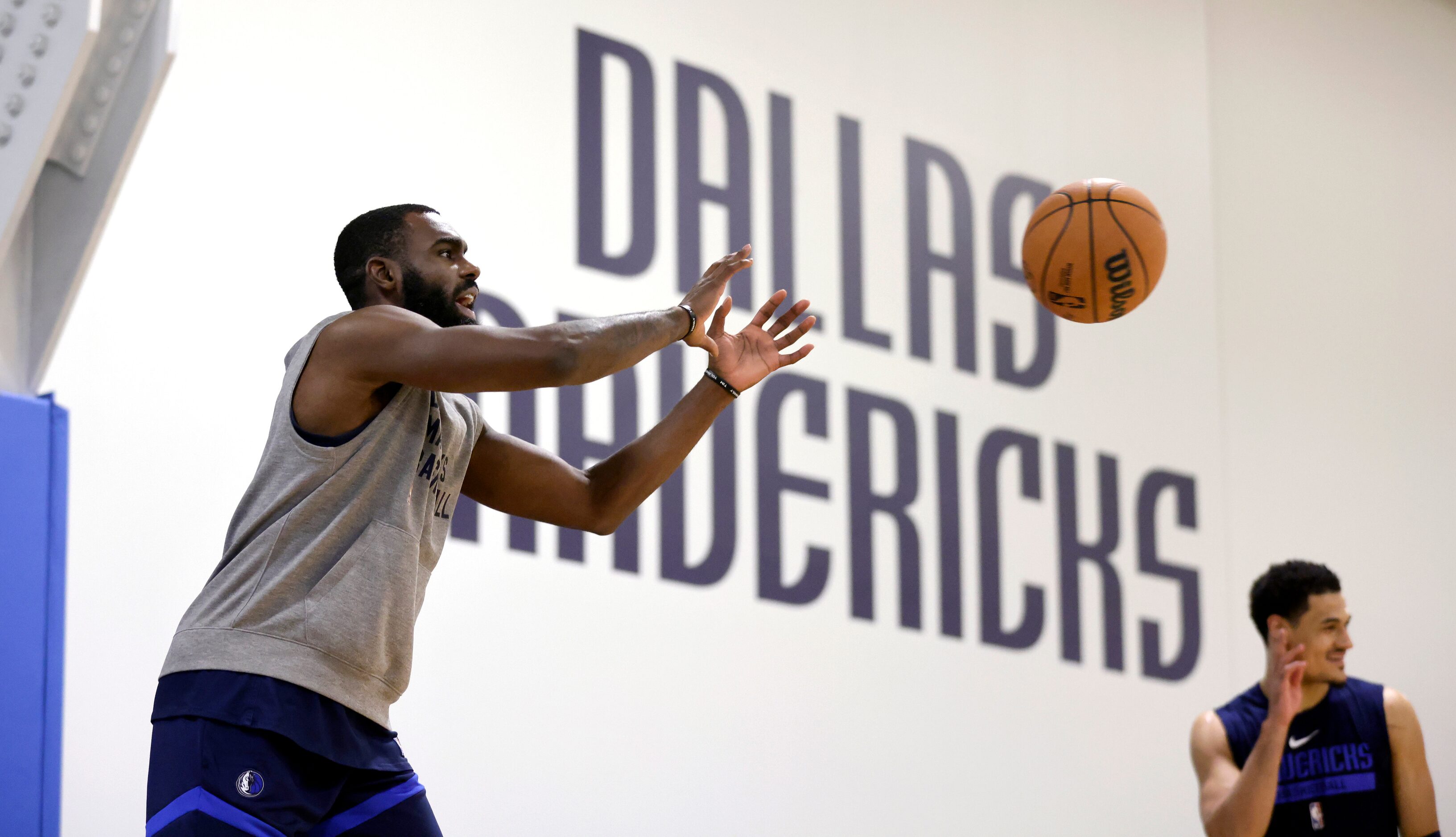 Dallas Mavericks forward Tim Hardaway Jr. takes a pass as he shoots 3-pointers at their...