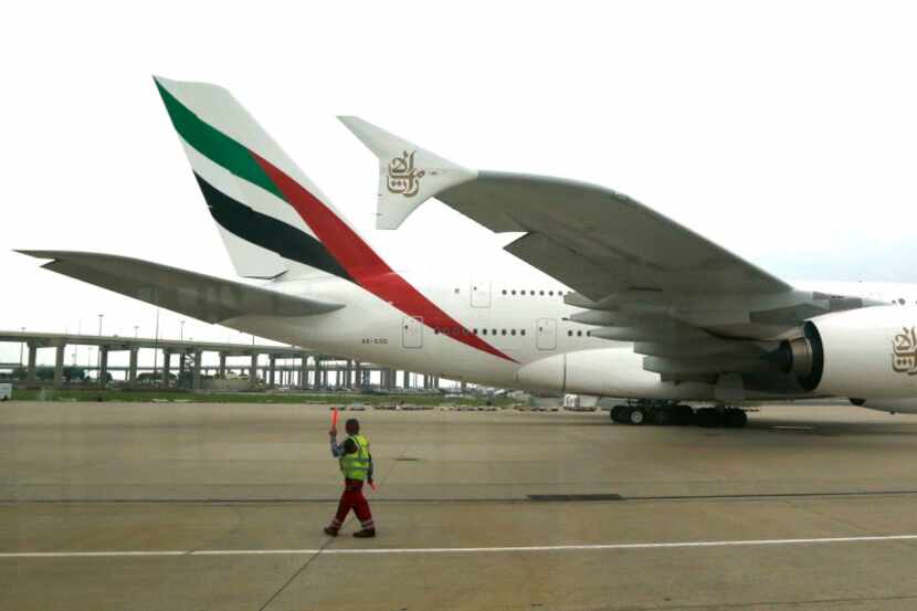  An Airbus A380 operated by Emirates Airline maneuvers at D/FW Airport on Thursday. (Michael...