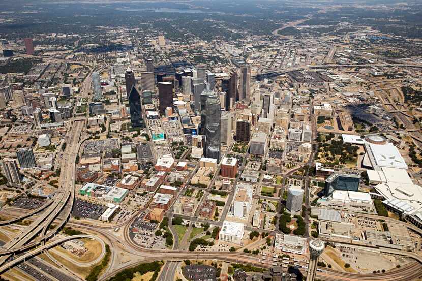 A 2015 aerial photo shows the ring of highways that circle around downtown Dallas. A new...