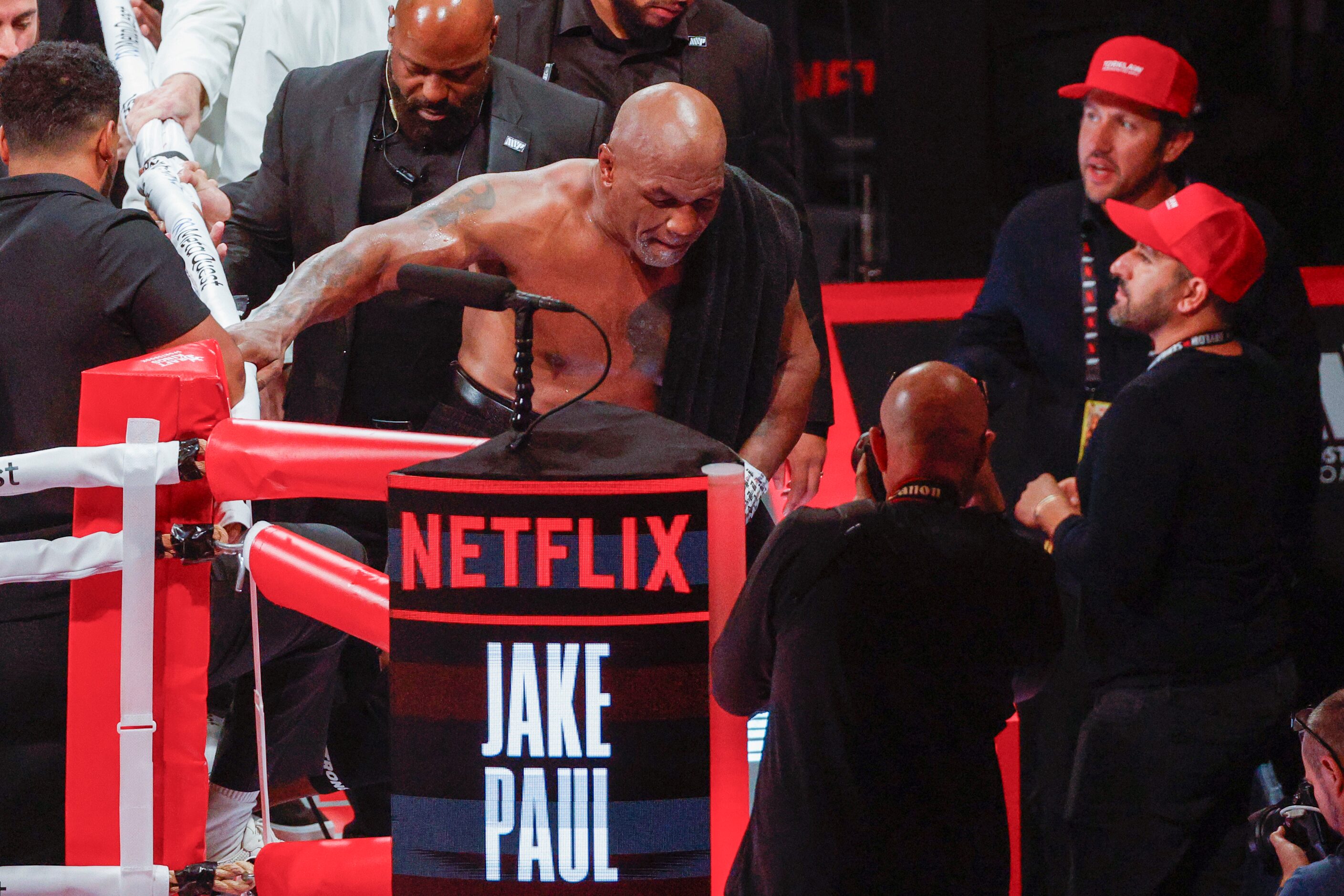 Mike Tyson exits the ring after a heavyweight boxing match against Jake Paul, Friday, Nov....