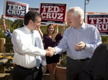  Then-Senate candidate Ted Cruz, left, greets Texas' senior senator, John Cornyn, at an...