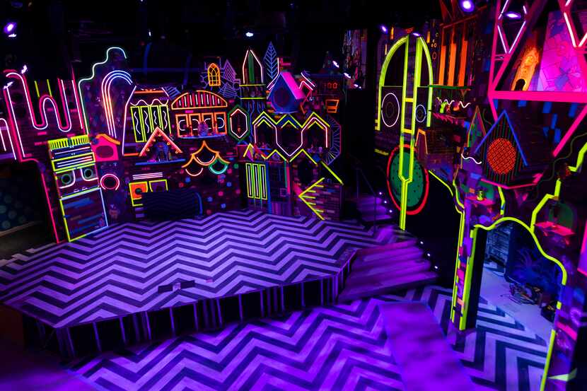 The stage at Meow Wolf Grapevine's "The Real Unreal" glowed with neon colors at Grapevine...
