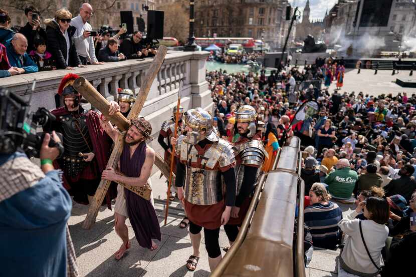 The Passion of Jesus is performed to crowds in Trafalgar Square, London, Friday, April 7,...