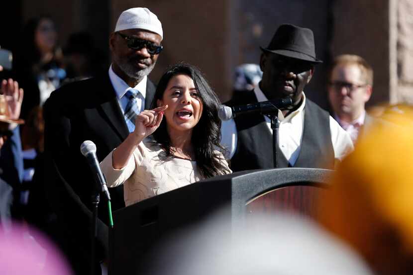Victoria Neave of Texas House District 107 speaks during a press conference at the steps of...