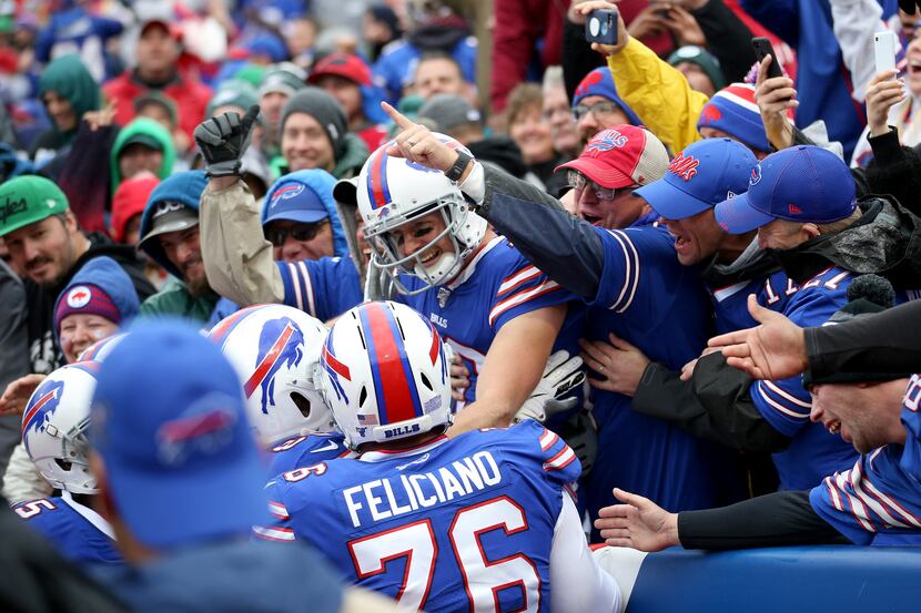 ORCHARD PARK, NEW YORK - OCTOBER 27: Cole Beasley #10 of the Buffalo Bills celebrates after...