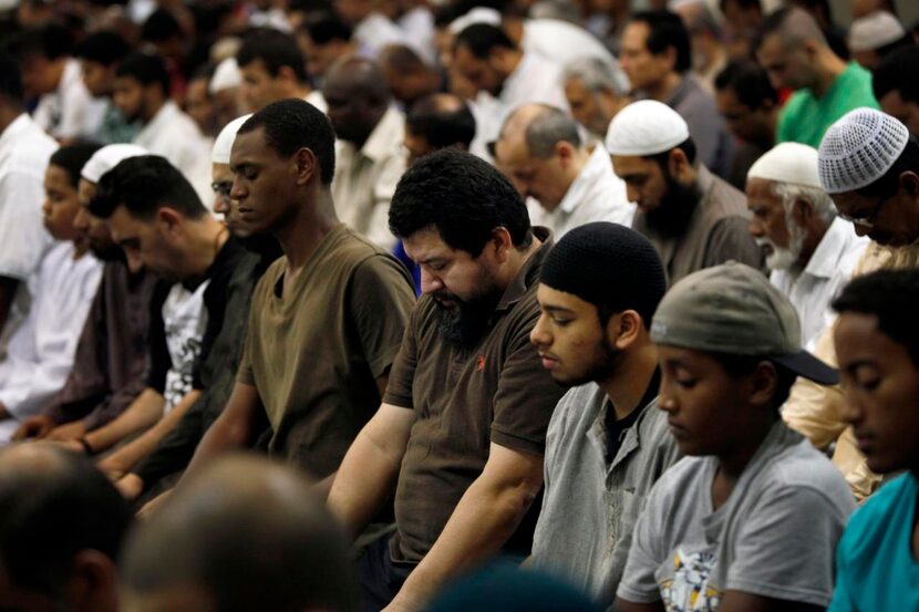 
Julio Cesar Molina (center), 42, participated in the nighttime daily prayer of Isha with...