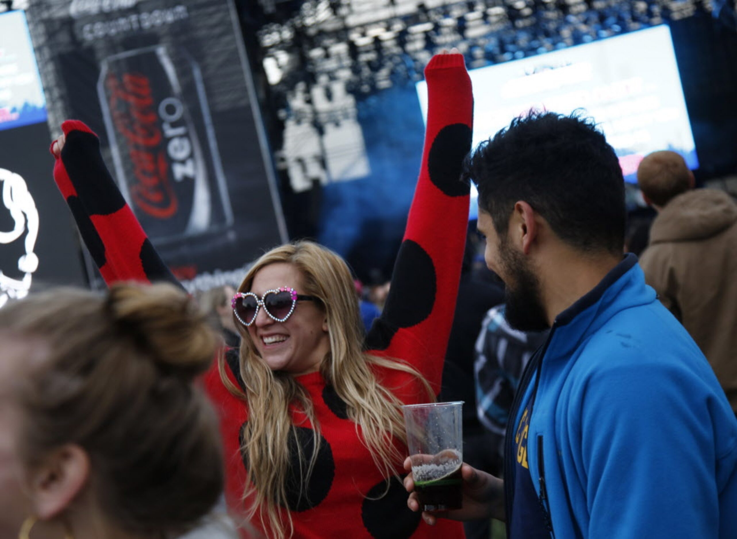 Lee Fedorko celebrates before The Killers went on during March Madness Music Festival at...