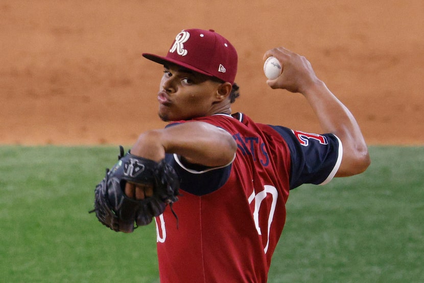 American League's pitcher Winston Santos (40)(TEX) delivers during the seventh inning of the...