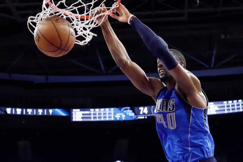 Dallas Mavericks forward Harrison Barnes dunks during the second half of an NBA basketball...