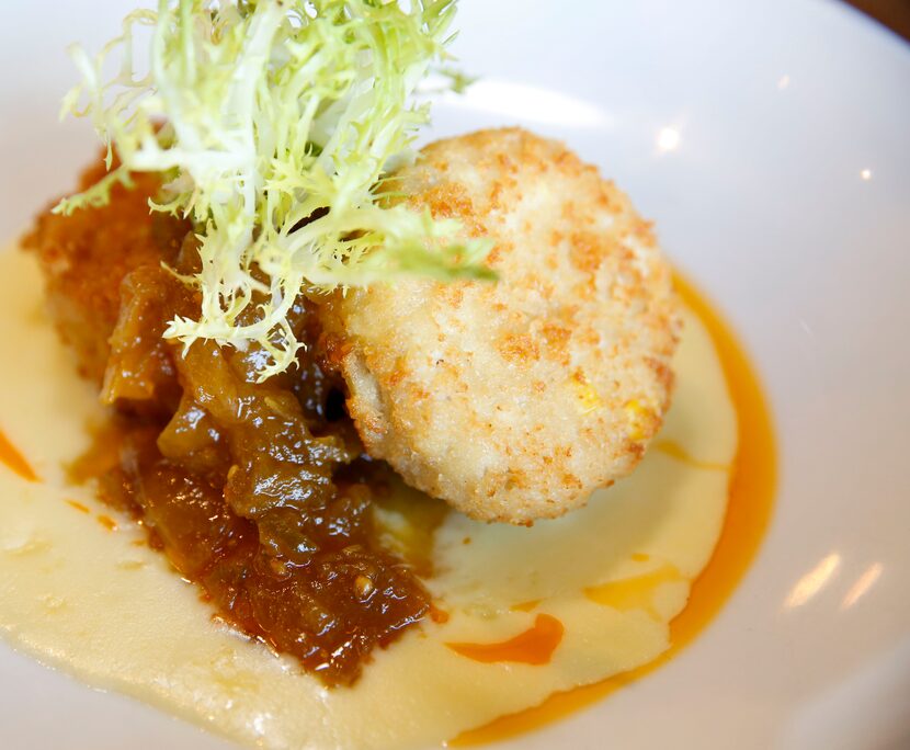 Crab cakes with sweet corn sauce and tomato chow chow at the Barn Light Eatery in Frisco,...