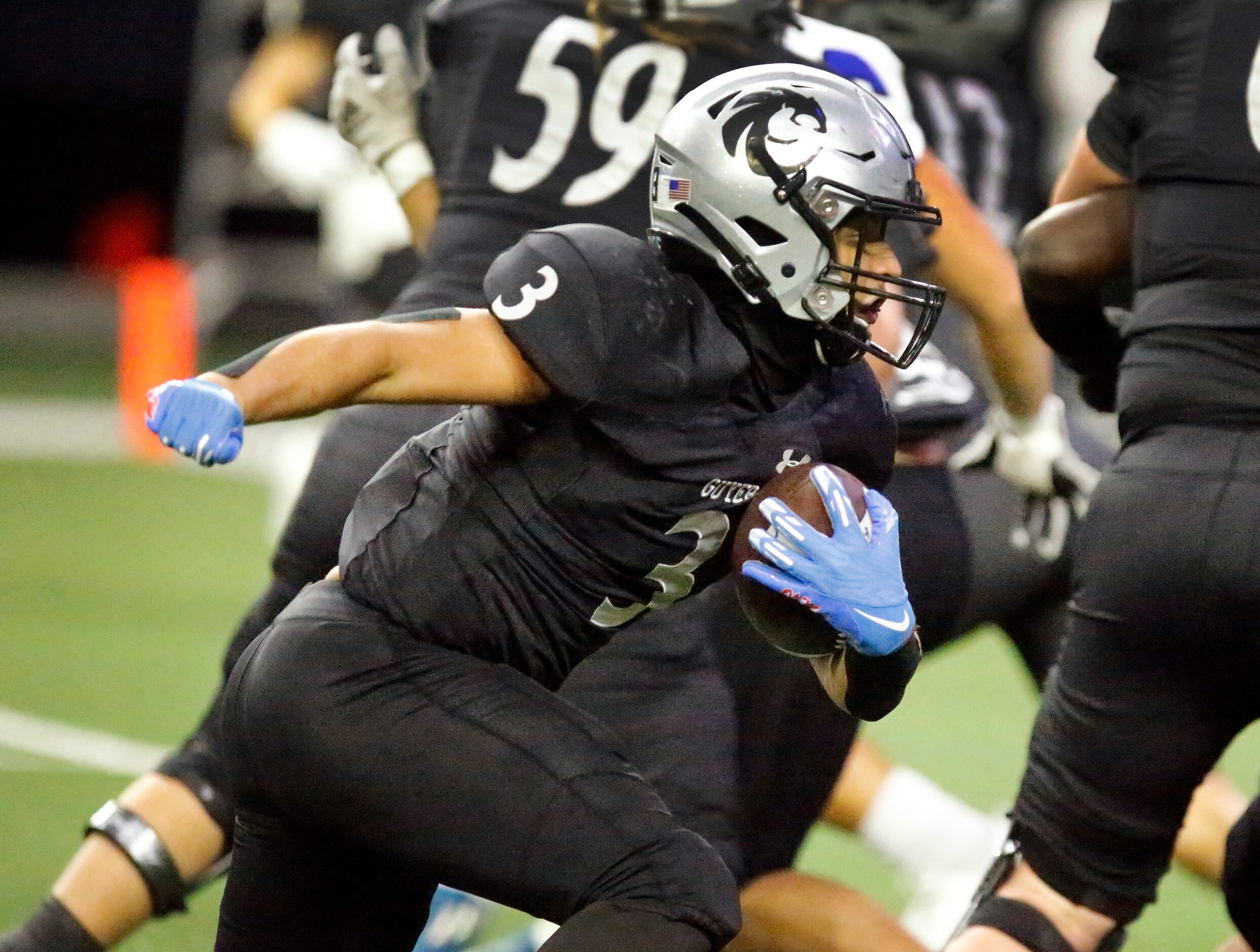 Guyer High School running back Trey Joyner (3) runs for a touchdown during the first half as...