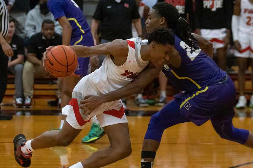 A player from Lake Highlands High School gets blocked by Richardson High School Cason...