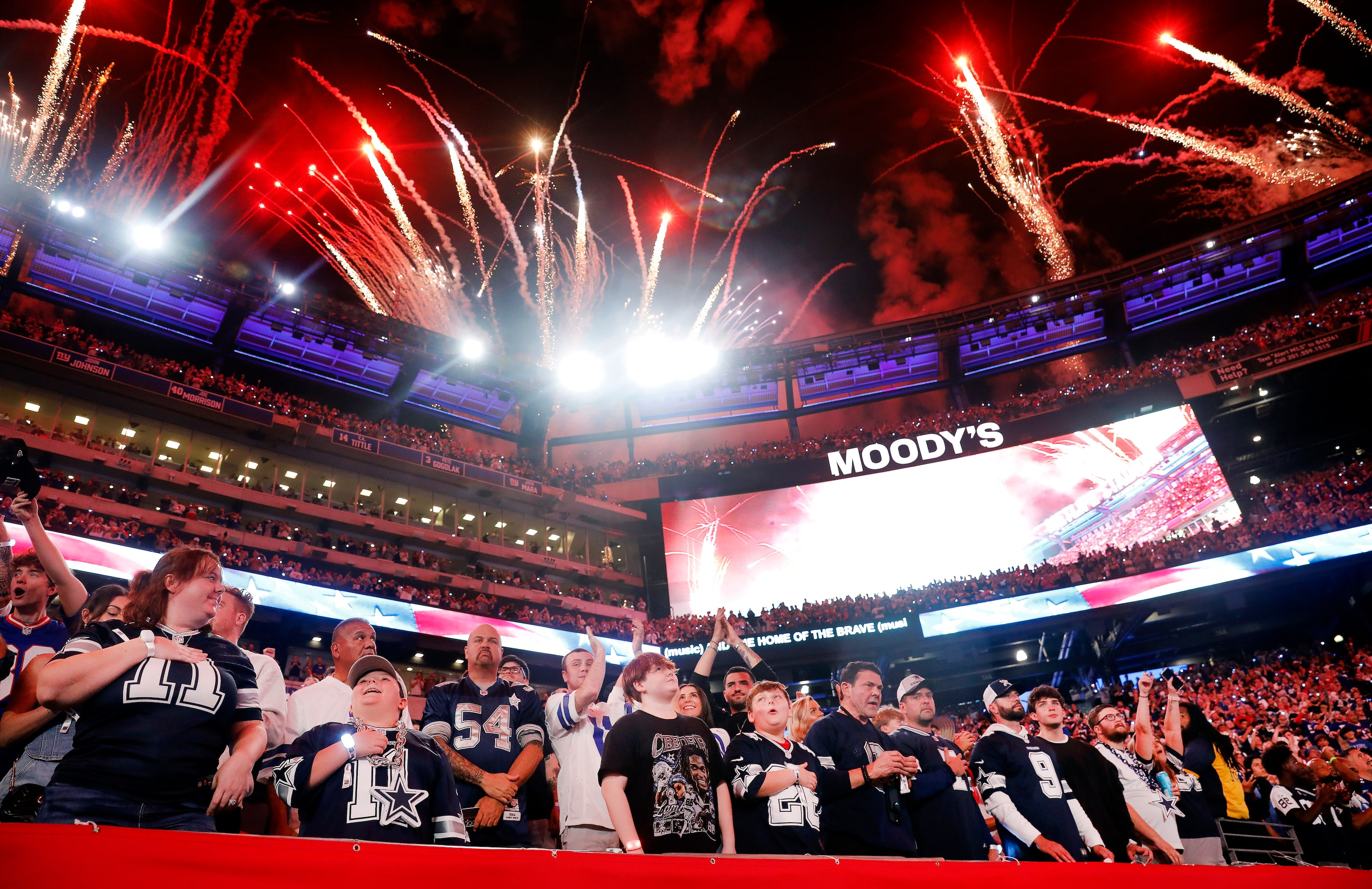 Fireworks explode over MetLife Stadium as the national anthem is sung before the Dallas...