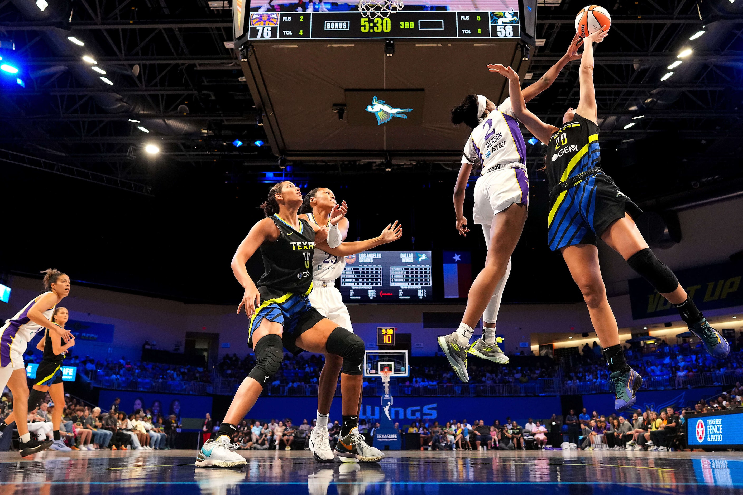 Los Angeles Sparks forward Rickea Jackson (2) blocks a shot by Dallas Wings forward Maddy...