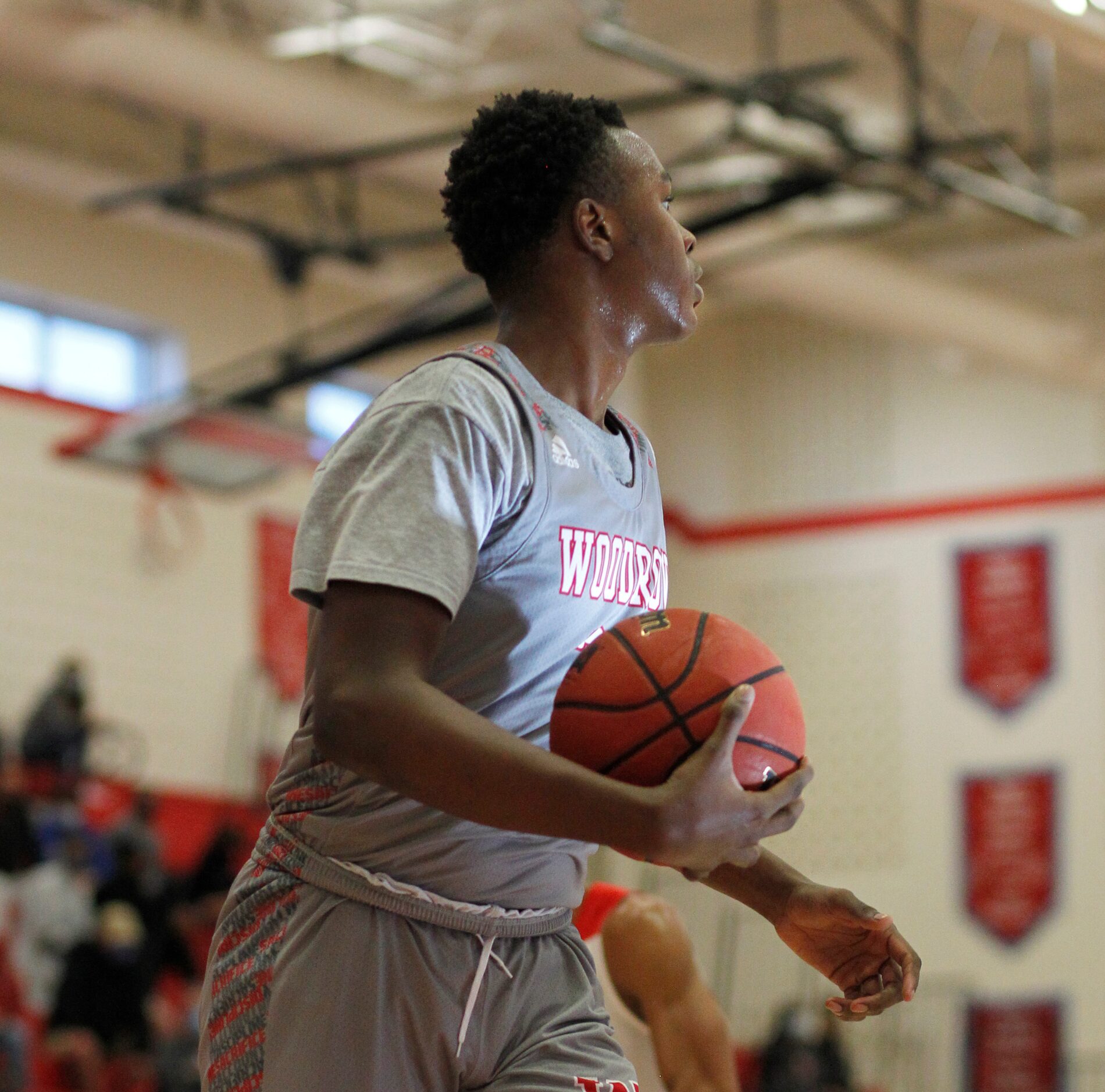 Dallas Woodrow Wilson's Deshawn Jagwan (32) watches as he checks for a play to be called in...