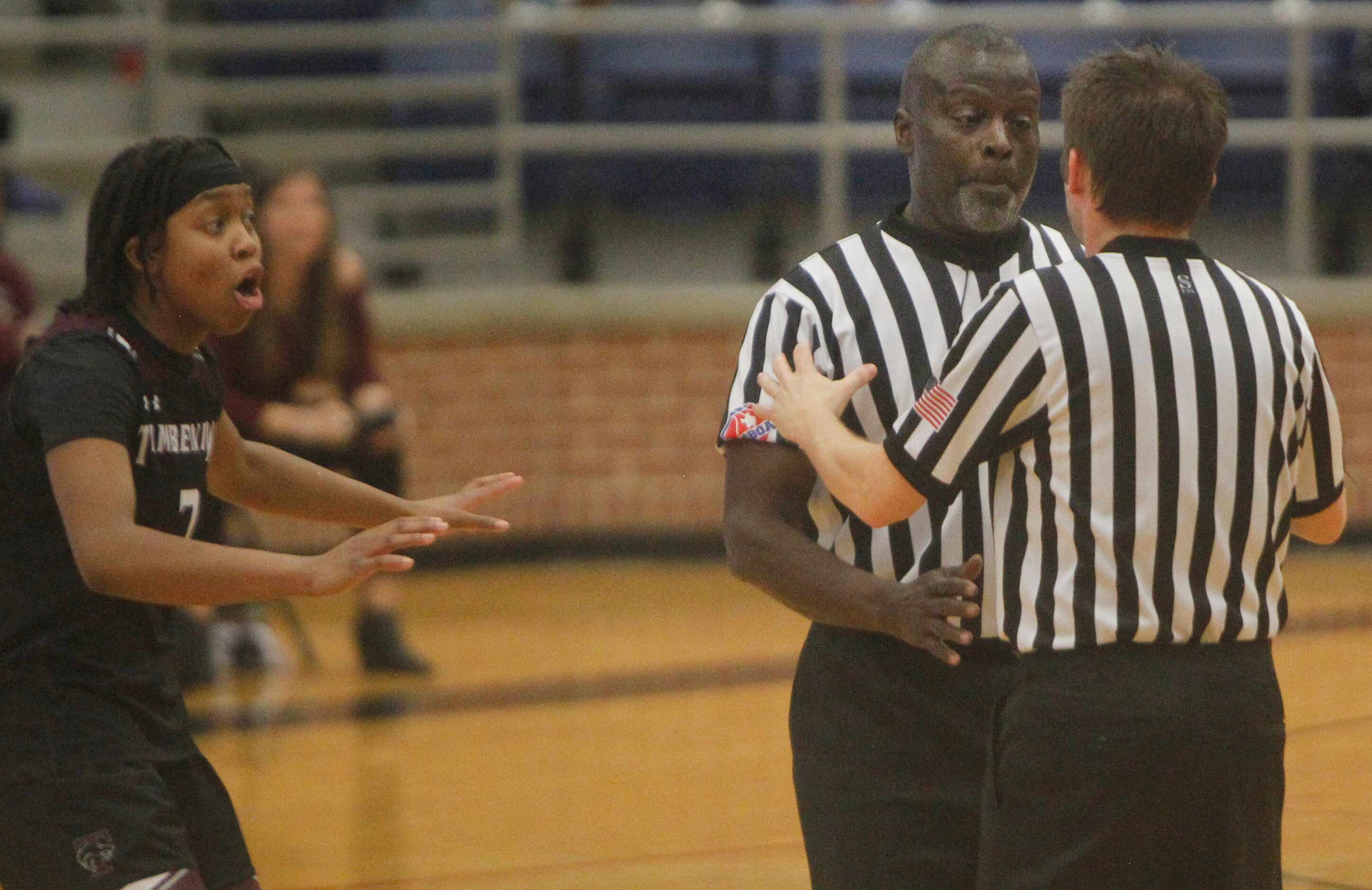 Mansfield Timberview guard Desiree Wooten (3) softly tries to interject a word as two game...