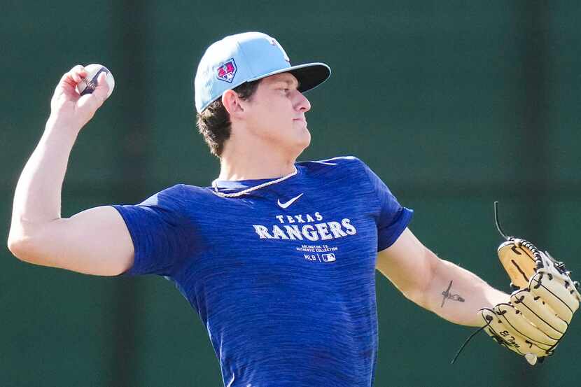 Texas Rangers minor league pitcher Izack Tiger participated in a spring training workout on...