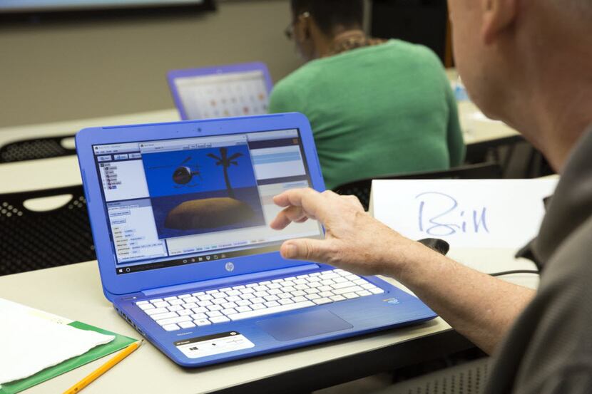 Bill Dunklau prepares his final project during a week long UTeach programming and coding...