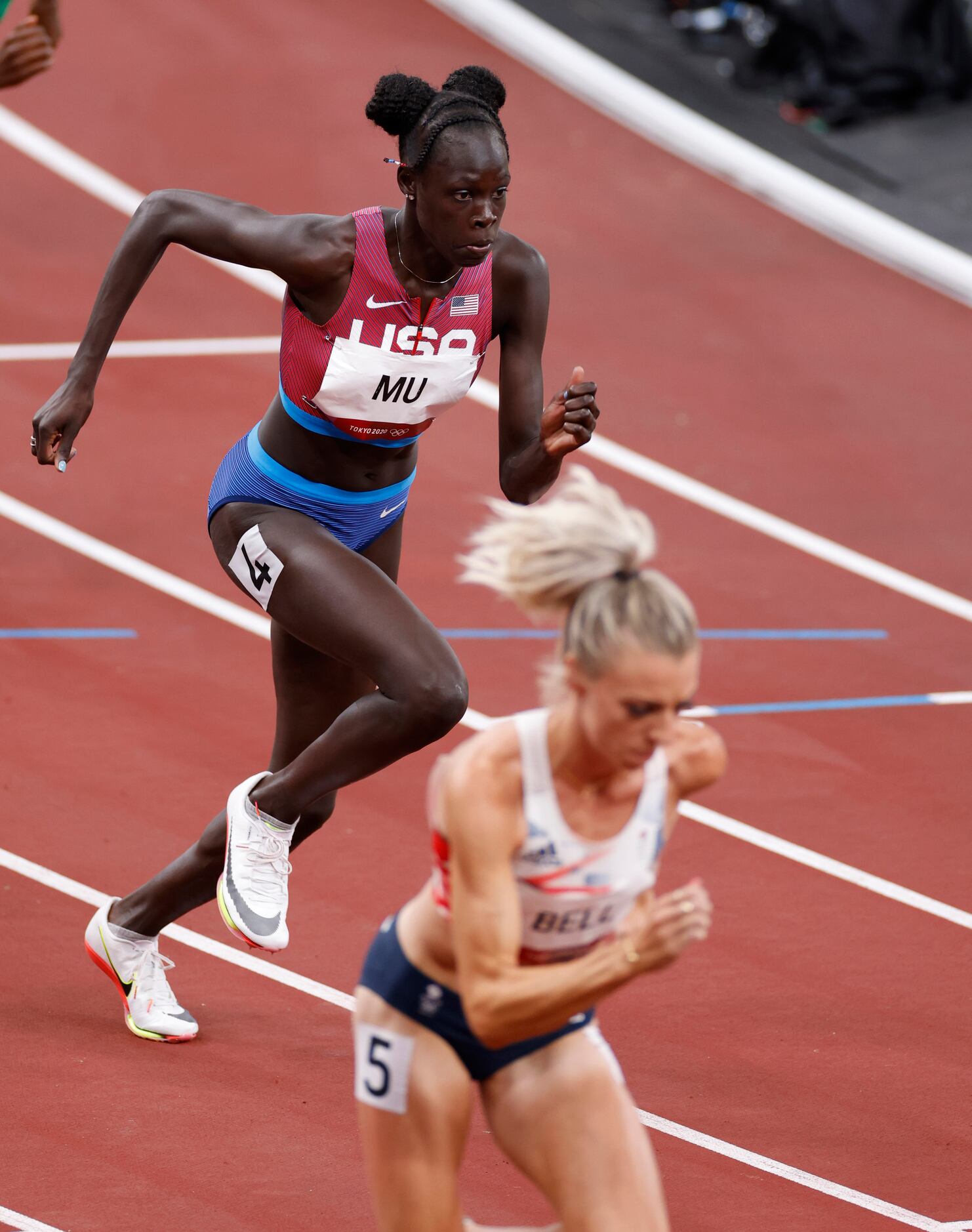 USA’s Athing Mu competes in the women’s 800 meter semifinal race during the postponed 2020...