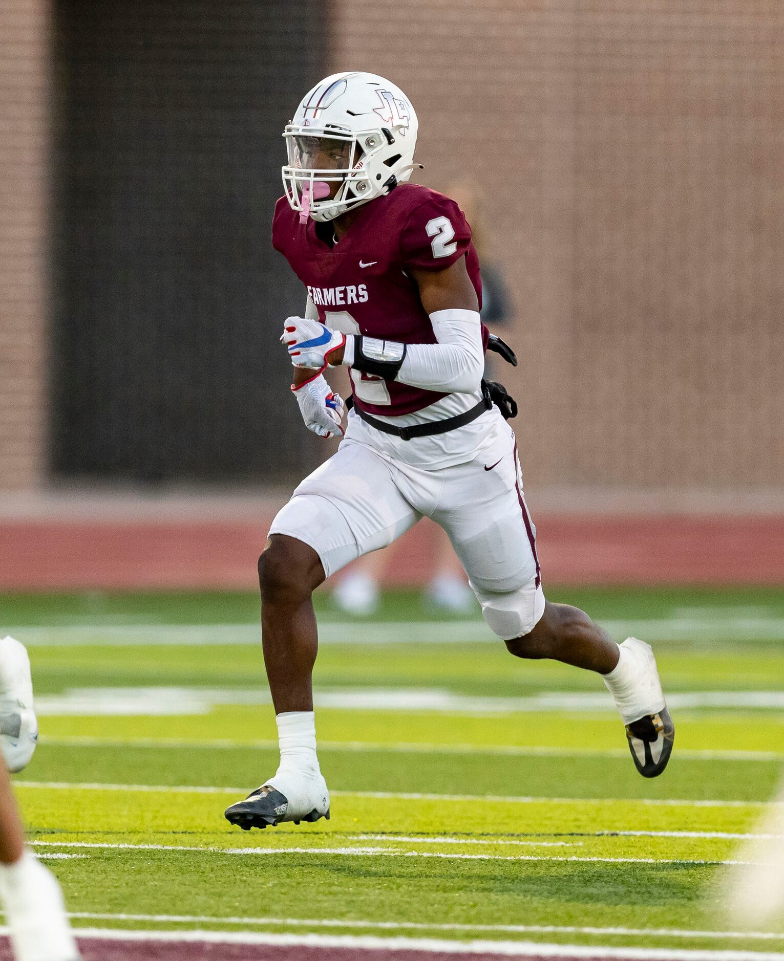 Lewisville senior defensive back Cameren Jenkins (2) defends on a kick return during the...