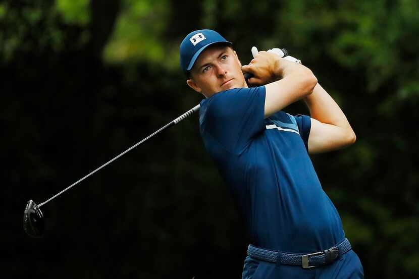 AUGUSTA, GEORGIA - APRIL 14: Jordan Spieth of the United States plays his shot from the...