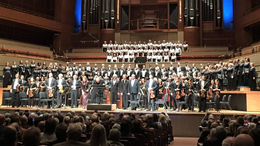 Music director Jaap van Zweden takes a bow, with soloists (L to R) James Gilchrist,...