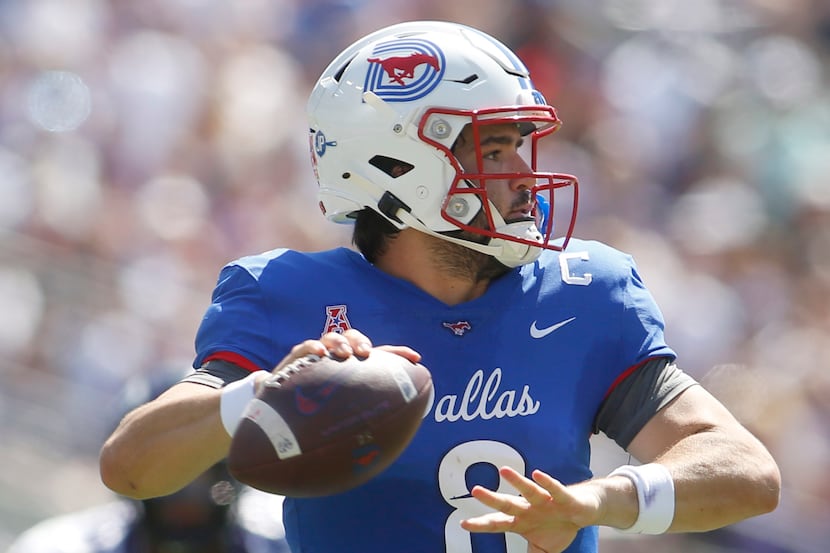 SMU quarterback Tanner Mordecai (8) looks to pass during the second quarter of play against...