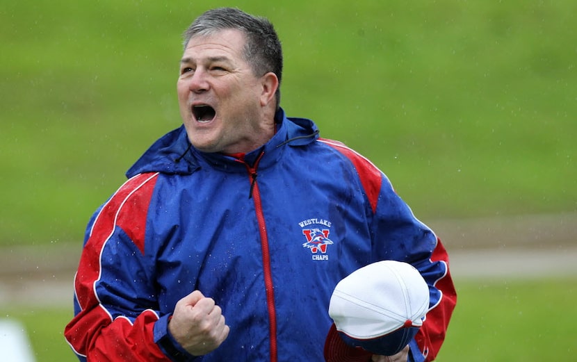 Westlake head coach Todd Dodge takes the field with his team during the Class 6A, Division I...