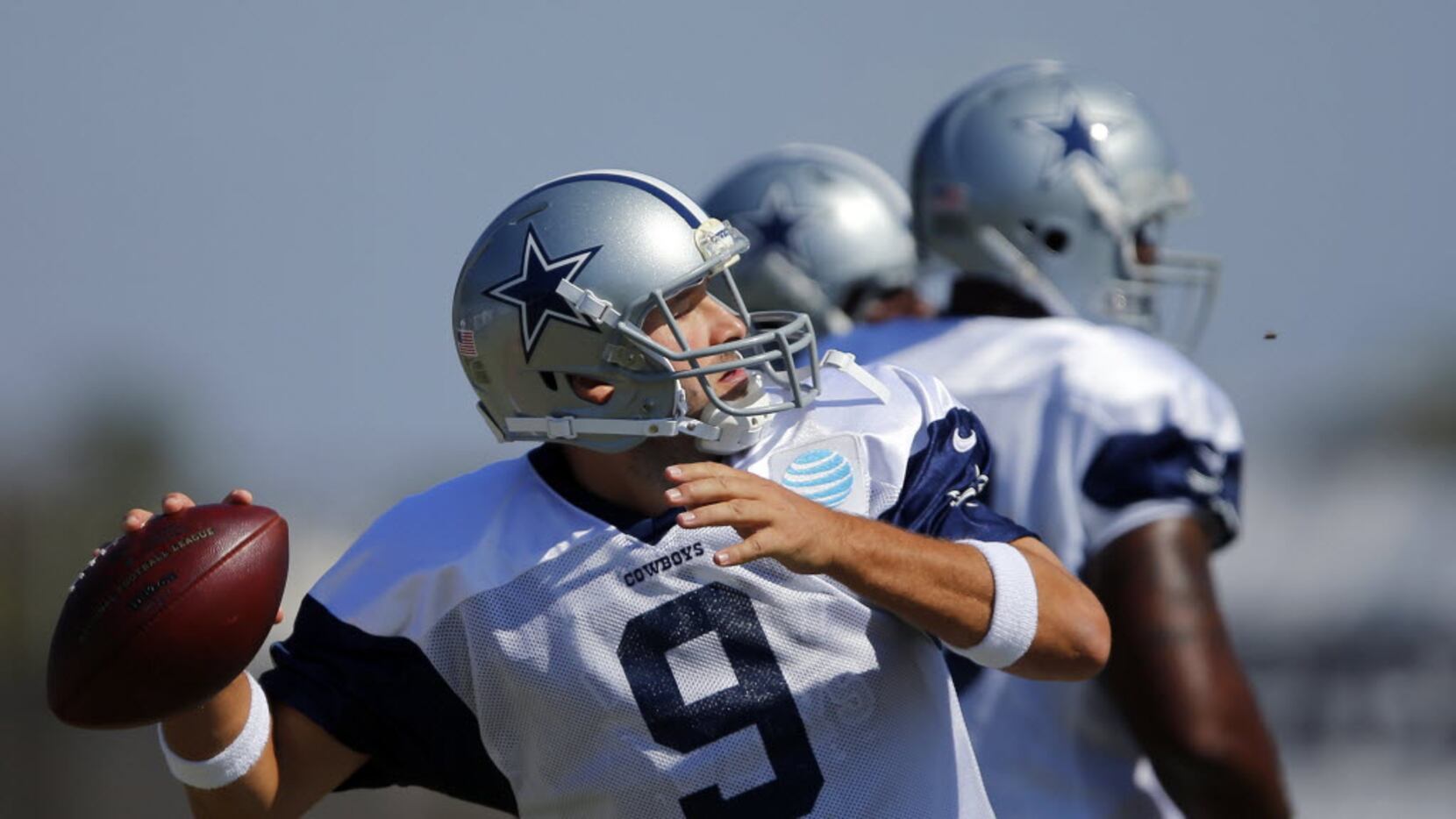 Dallas Cowboys quarterback Tony Romo (9) fires a long long pass down field during afternoon...