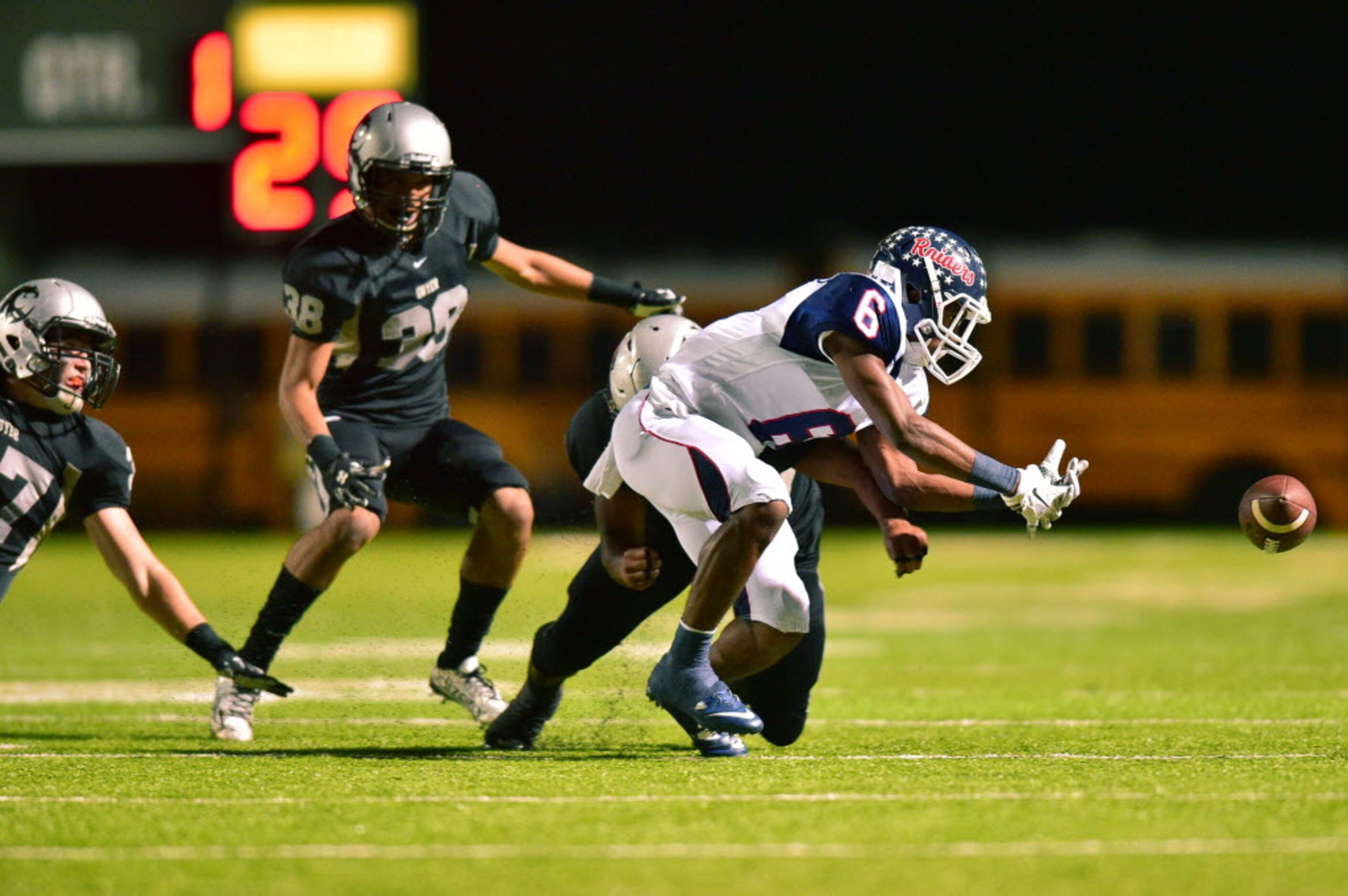 Ryan sophomore defensive back Tamar Butts (6) reaches out for the ball after missing the...