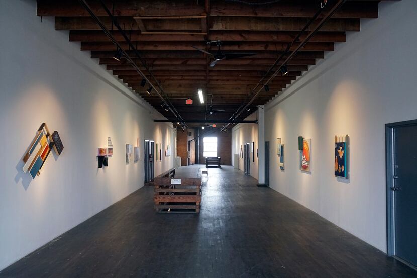 Contemporary art from 2D, 3D, photography, to new media filled the space at 500X Gallery in...