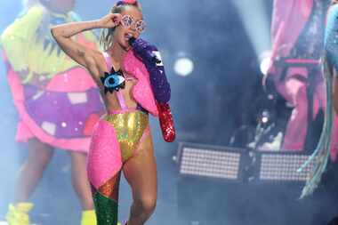 Miley Cyrus performs at the MTV Video Music Awards at the Microsoft Theater on Sunday, Aug....