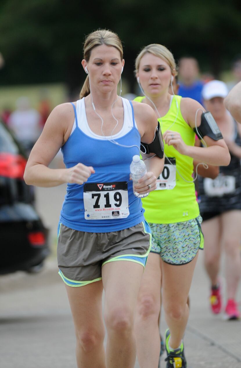 Brooke Cowart concentrates as she runs the Hottest Half at Norbuck Park on Sunday, August...