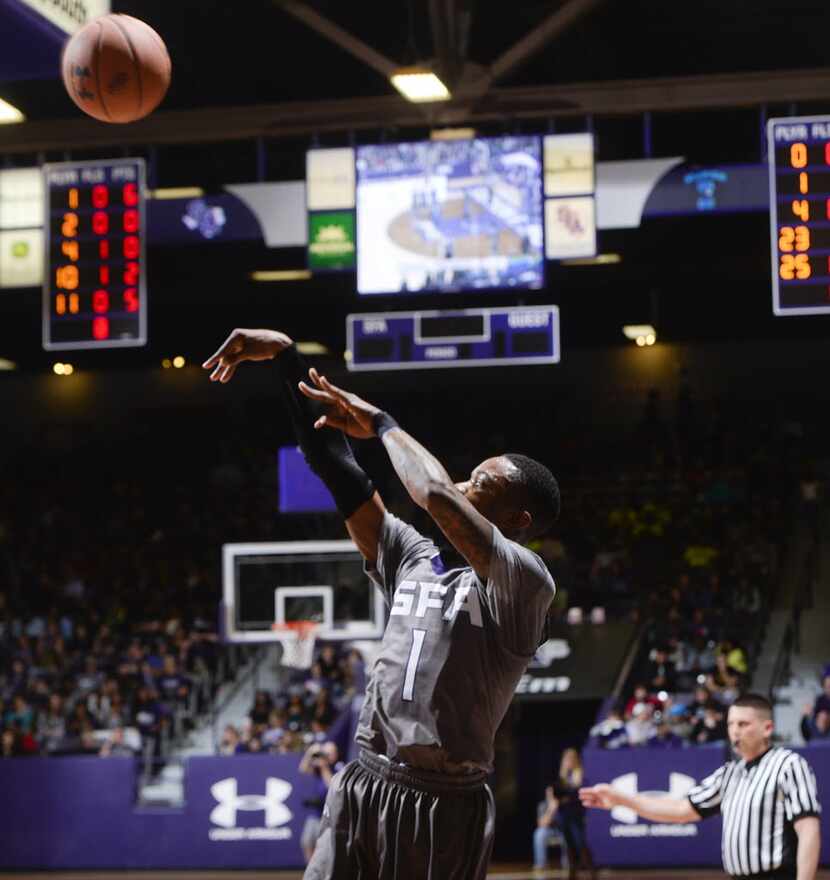 Stephen F. Austin State's Demetrius Floyd sinks a 3-pointer against Texas A&M-Corpus Christi...