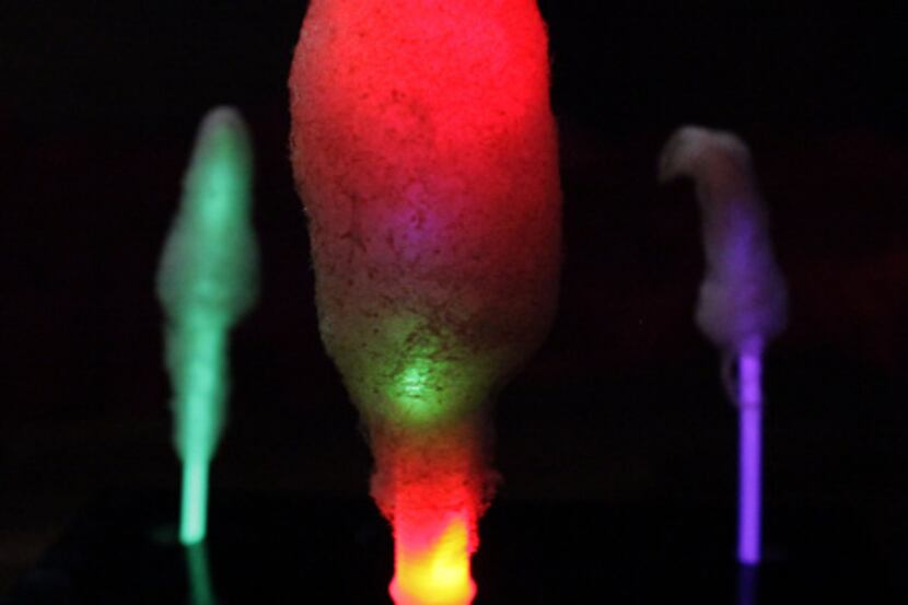 Yasmeen Tadia's glow in the dark Fluffpops, tiny gourmet cotton candy pops spun on sticks...